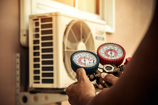Professional Air Conditioning Service technician working in Meridian, TX